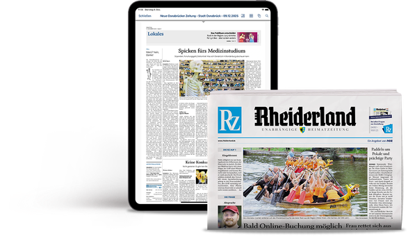 Tablet mit einer Artikelseite und eine Zeitungsrolle des Ostfriesischen Kuriers